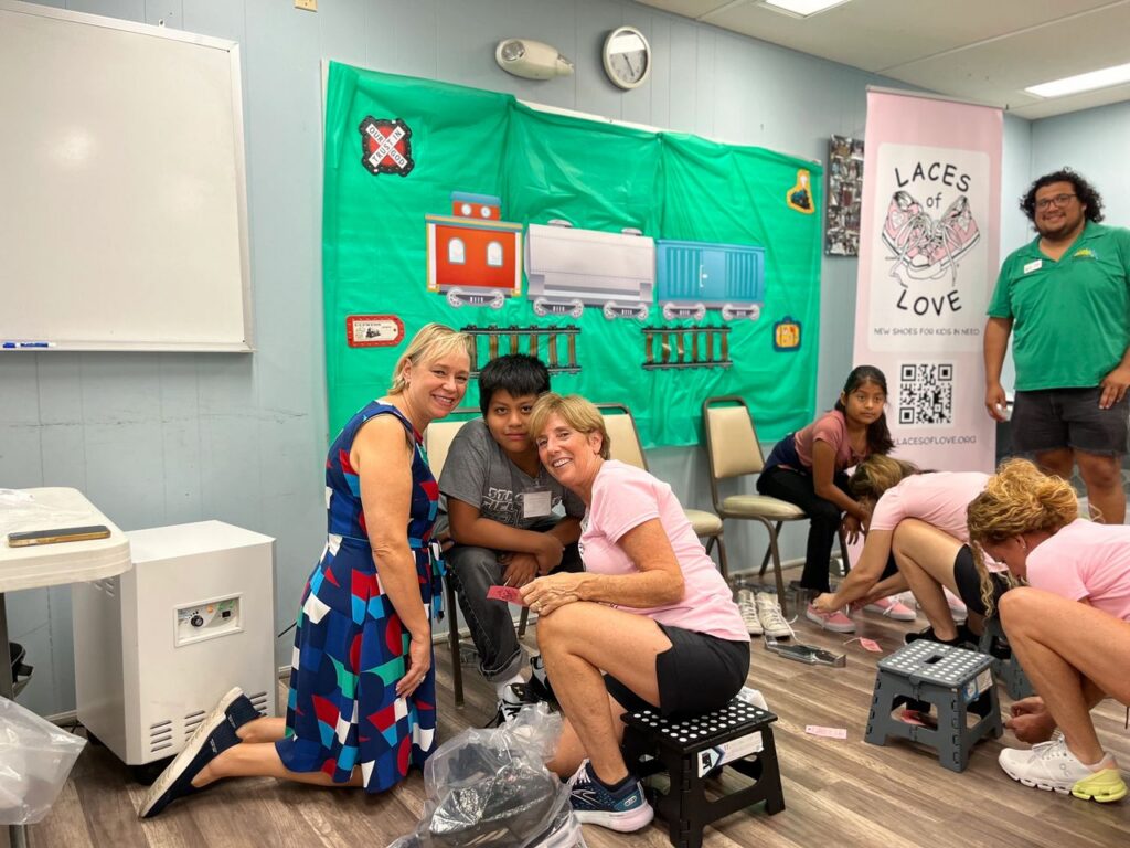 Linda Cunning, CEO of New Horizon, and Leanne Nealon, Co-Founder of Laces of Love, assuring New Horizon students receive the correct fit.