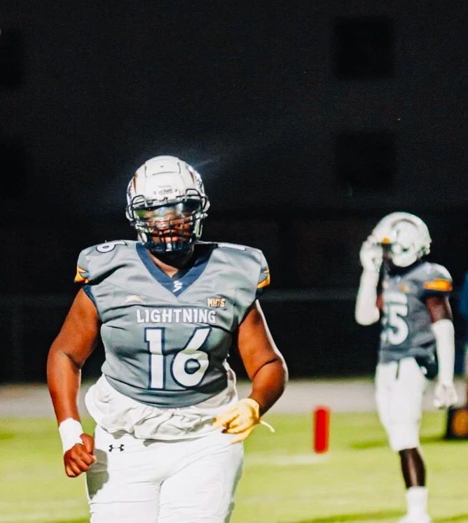 Eric, playing football for East Lee High School